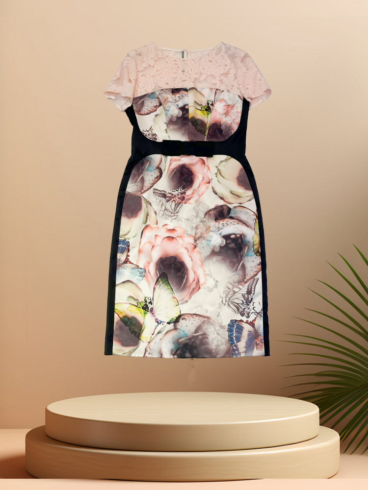 Marccain Flora Dress featuring floral print and black side stripes, perfect for spring occasions.