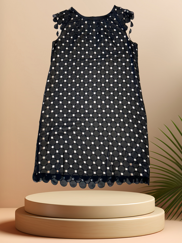Seventy Black Dress featuring a cute disc design and A-line cut, perfect for spring and summer fashion.