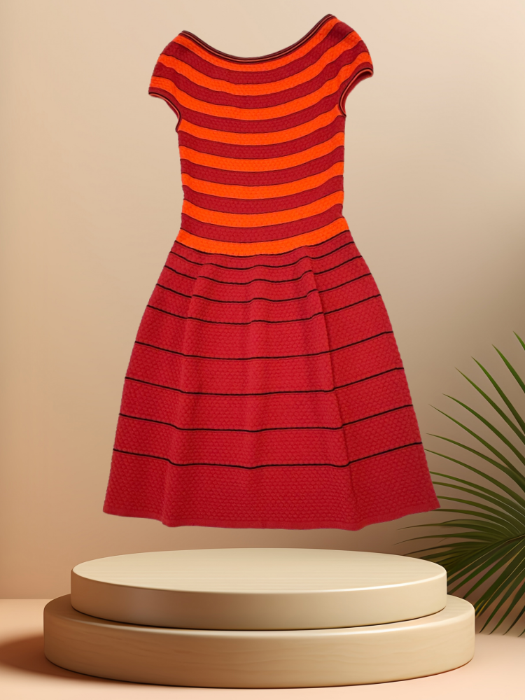Marccain orange striped dress with circular skirt and round neckline, perfect for spring and summer fashion.