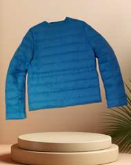 Escada Reversible Puffer jacket in blue, lightweight and stylish with goose down filling for warmth and versatility.
