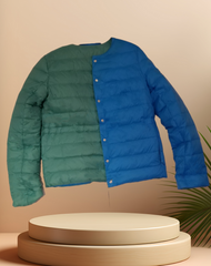 Escada reversible puffer jacket displaying green and blue sides, showcasing stylish, lightweight design for warmth and versatility.