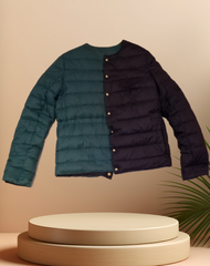 Escada Reversible Puffer jacket showcasing teal and dark purple sides, combining style and warmth with goose down filling.