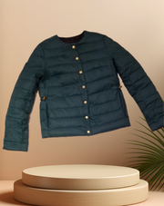 Escada Reversible Puffer jacket in teal, lightweight with goose down filling for warmth and style.