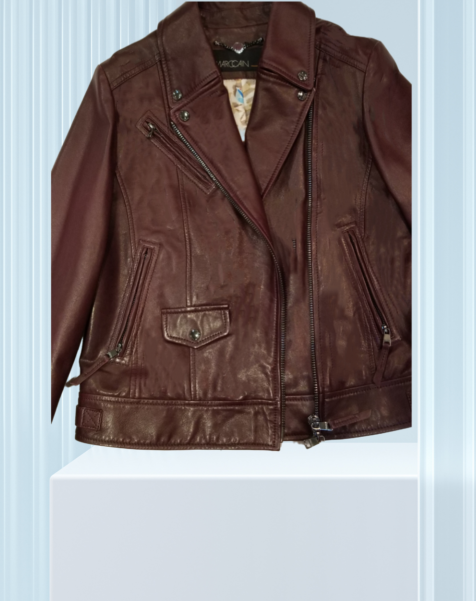 Marccain Leather Jacket in burgundy, featuring classic cut and stylish zippers, perfect for a bold fashion statement.