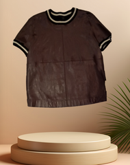Marccain Leather Blouse showcasing luxurious leather and cozy knit design, combining comfort and style.