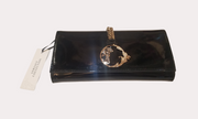 Versace Clutch featuring a classic black and gold design, perfect for elevating party and formal outfits.