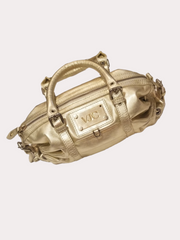 Versace gold handbag featuring a stylish design, perfect for casual outings and party events.