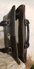 Versace Black Handbag, expertly crafted with leather, spacious interior, sleek design for stylish everyday use.