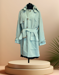 Nic Janik Green Linen Coat on display, made of breathable linen, featuring a stylish belted design and two collar options.