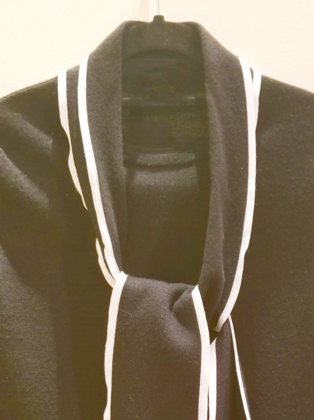 Escada blouse featuring an adjustable tie design and comfortable viscose fabric, perfect for a stylish look.