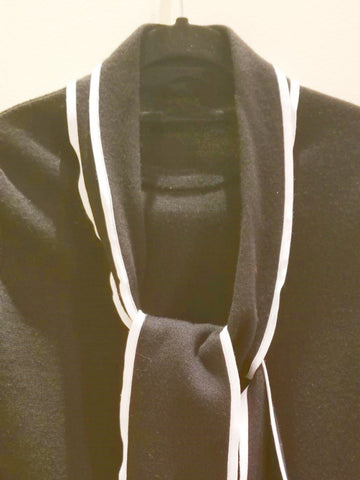Escada blouse featuring an adjustable tie design and comfortable viscose fabric, perfect for a stylish look.