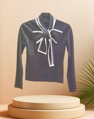 Stylish Escada blouse in black, featuring a unique adjustable tie design for a comfortable fit.