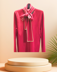 Escada blouse in vibrant pink with adjustable tie design for versatile styling and comfort.