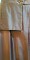 Close-up of the Laurel Long Straight Skirt showcasing its unique shine fabric and tailored design.