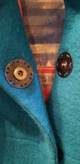 Close-up of Save the Queen Cyan Blue Coat's buttons and fabric details, showcasing elegance and craft.