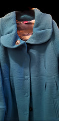 Save the Queen cyan blue coat with flower collar and soft fabric for a sophisticated, timeless look.