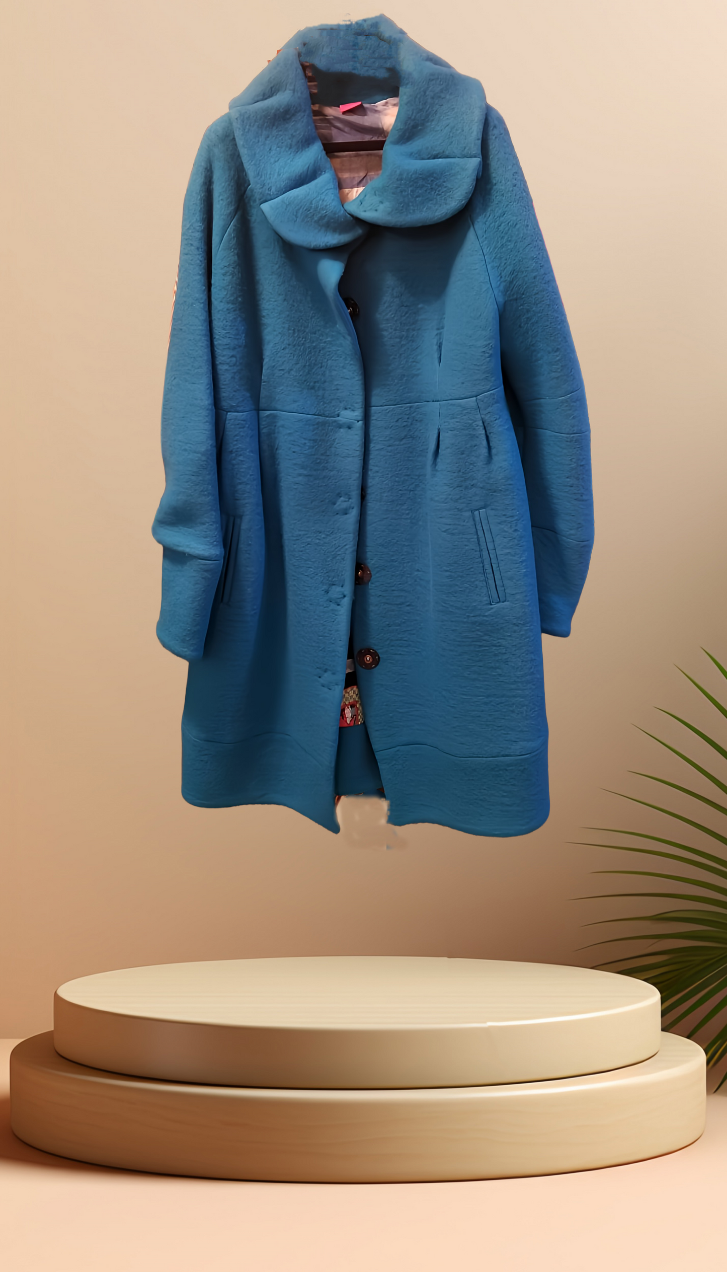 Save the Queen cyan blue coat with flower collar on display, made of soft wool blend for a sophisticated look.