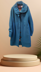 Save the Queen cyan blue coat with flower collar on display, made of soft wool blend for a sophisticated look.