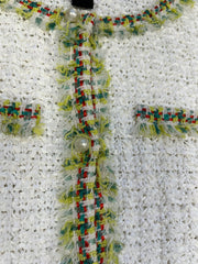 Close-up of Marccain Whit Spring Jacket featuring colorful neckline, cuffs, and pearl buttons for stylish spring attire.