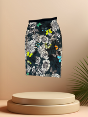 Marccain flower and butterfly printed skirt on display, featuring a slim fit and vibrant floral design.