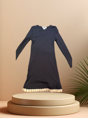 Crisca black wool dress made of 100% virgin wool with a stylish hem, perfect for casual and special occasions.