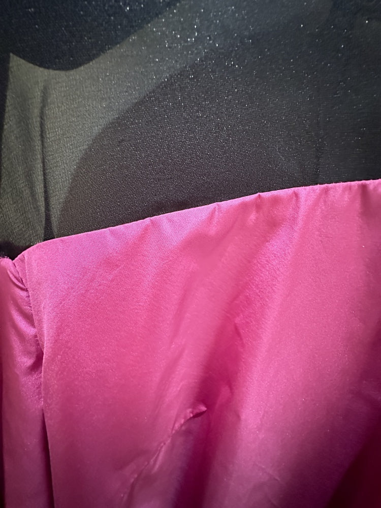 Close-up of luxurious Escada purple silk dress showcasing soft silk and elegant black tulle details.