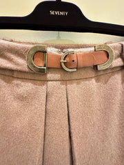 Close-up of the Seventy A-Line Skirt's waist with a stylish belt and buckle detail on a hanger.