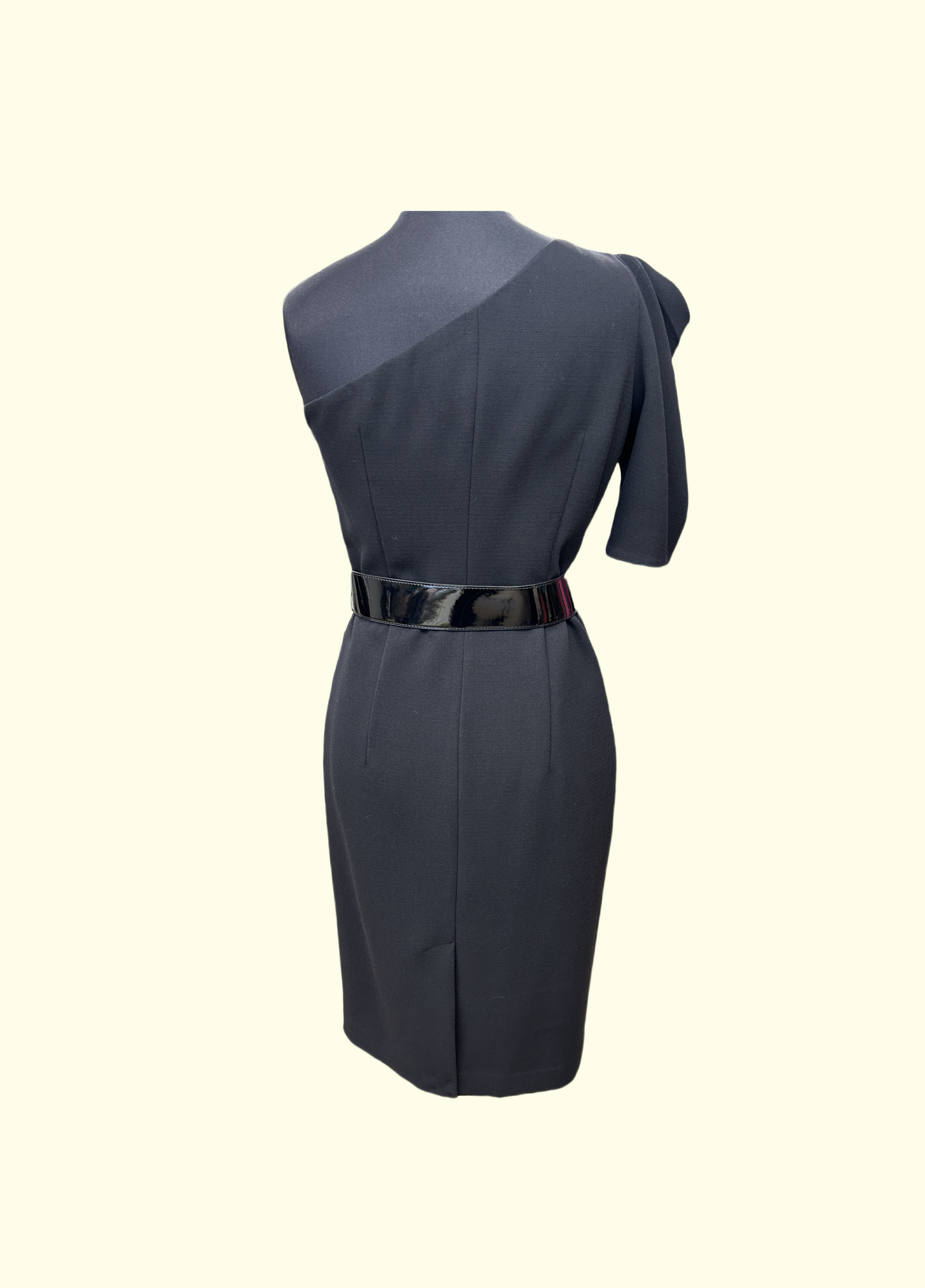 Back view of Michael Kors black one-shoulder dress featuring a sleek design and stylish belt.