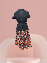 Stylish black blouse with floral patterned skirt, ideal for casual or formal occasions.