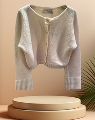 Marccain creamy cardigan in lightweight merino wool blend, featuring a short-waisted design and button closure.