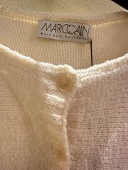 Marccain Creamy Cardigan close-up, showcasing soft texture and buttons, perfect for winter layering.