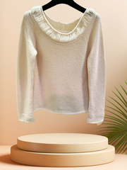 Marccain sweater in creamy color, featuring a thread neckline and ribbed cuffs for comfort, displayed on a hanger.