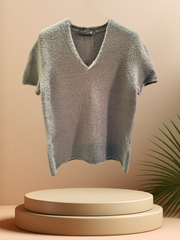 Marccain gray blouse with a V-neck, made of wool blend, perfect for stylish winter or early spring wear.