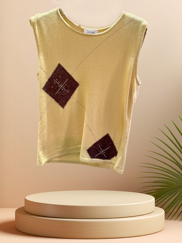 Laurel Vest in soft yellow fabric featuring brown geometric designs, perfect for stylish everyday wear.