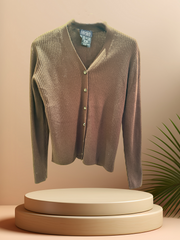 Escada Brown Cardigan displayed on a pedestal, featuring a classic cut and ribbed texture, perfect for fall and winter outfits.
