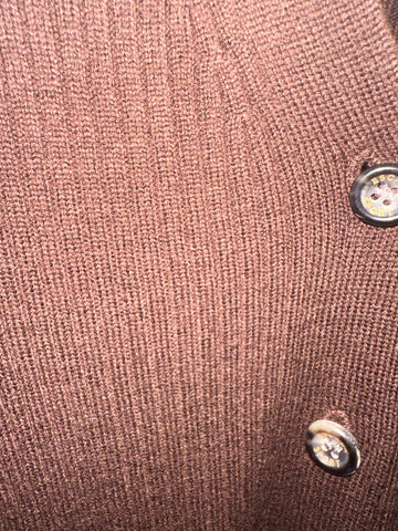 Close-up detail of Escada brown cardigan fabric with buttons, showcasing its classic cut and soft texture.