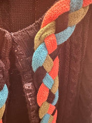 Save the Queen Cardigan featuring a colorful braided accent, perfect for adding style to any outfit.