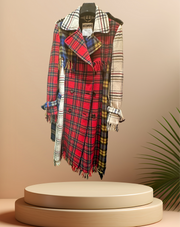 Moschino Long Tartan Coat featuring a vintage plaid design and elegant long cut, displayed on a pedestal.