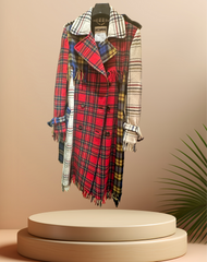Moschino Long Tartan Coat featuring a vintage plaid design and elegant long cut, displayed on a pedestal.