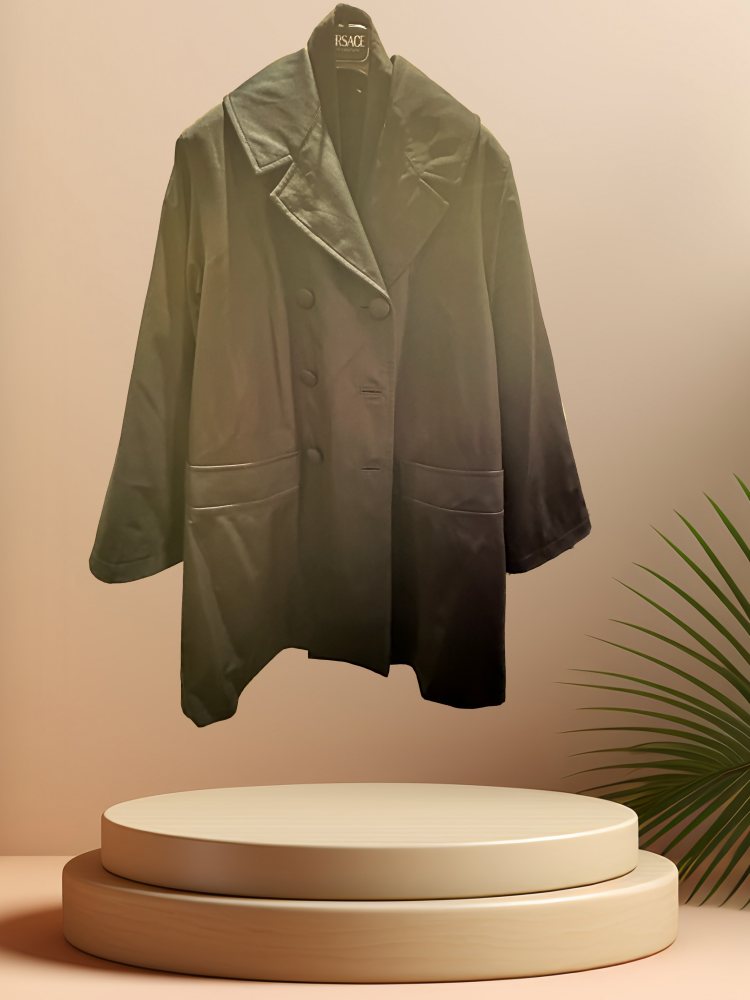 Versace black coat with detachable rabbit fur lining displayed on a podium, showcasing its stylish design.