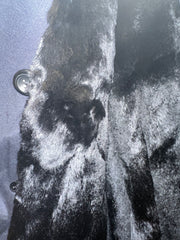 Close-up of the luxurious rabbit fur lining of the Versace Black Coat, highlighting its premium texture and quality.