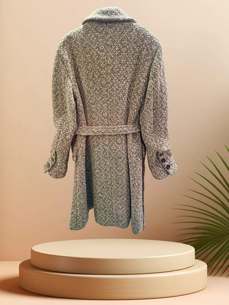 Back view of a Marccain long coat with a vintage design, featuring a detachable belt and wool blend fabric.