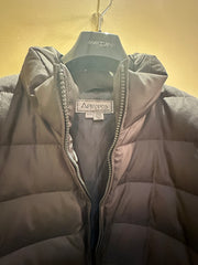 Apropos Long Down Coat interior view showcasing its warm down filling and sleek design.