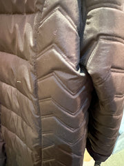 Close-up of the Apropos Long Down Coat showcasing its stylish chevron quilted design in black.