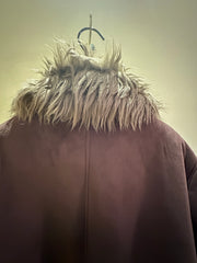 Back view of Novelti Long Coat with a stylish fur collar, perfect for warmth and sophistication.