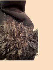 Close-up of the fur collar of the Novelti Long Coat, showcasing its luxurious texture and elegant design.
