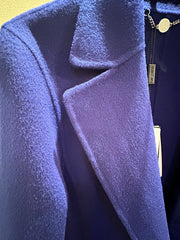 Close-up of Marccain royal blue long coat showcasing the soft wool texture and stylish collar design.
