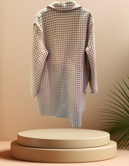 Marccain Houndstooth Long Coat displayed on a stand, showcasing its luxurious 100% wool design and stylish pattern.