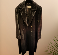 Laurel Black Long Coat featuring a luxurious wavy pattern and mandarin collar, perfect for the season's stylish warmth.