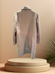Back view of Marccain Wheat Long Coat, made with 60% wool and 40% cashmere, showcasing its classic winter style.